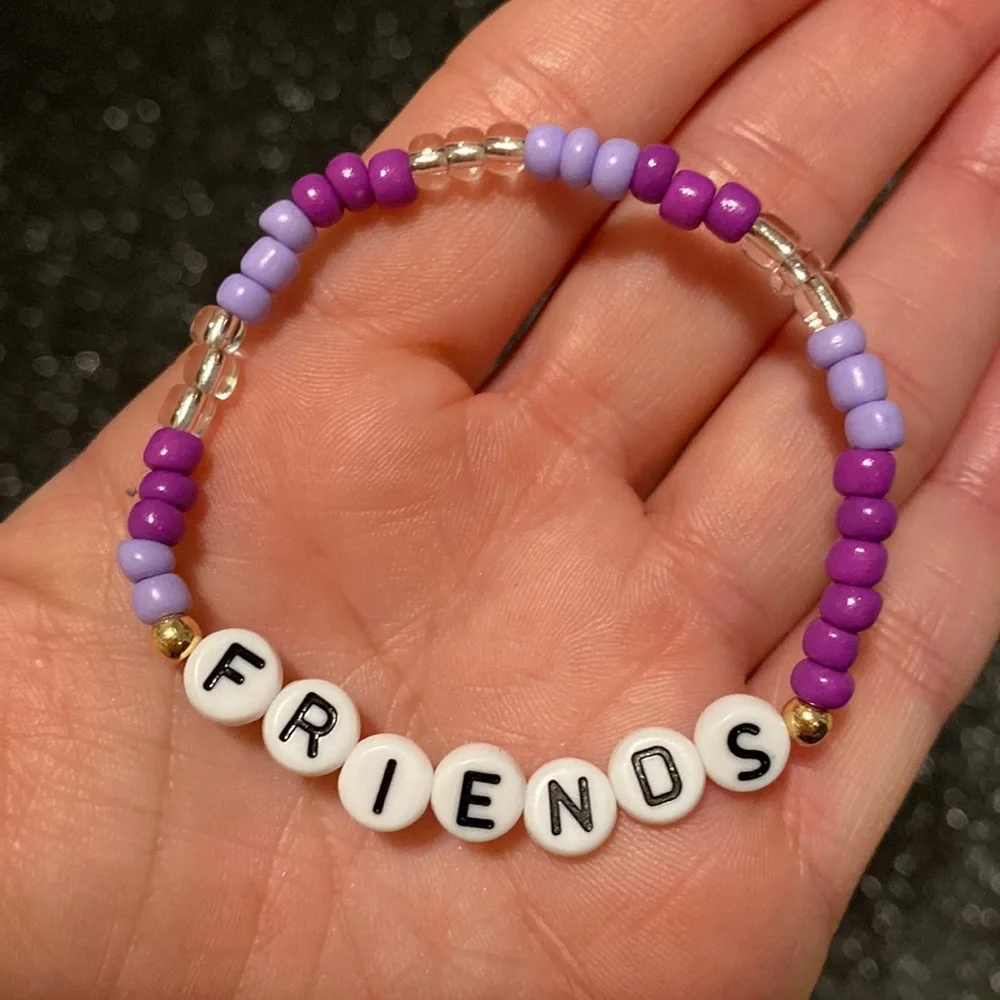 Kids multi purple bead stretch bracelet